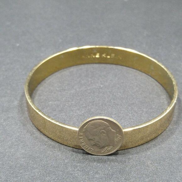 Anne Klein Solid Gold Tone Bangle Bracelet, 7 3/4 Inches, Very Reflective - Picture 7 of 8